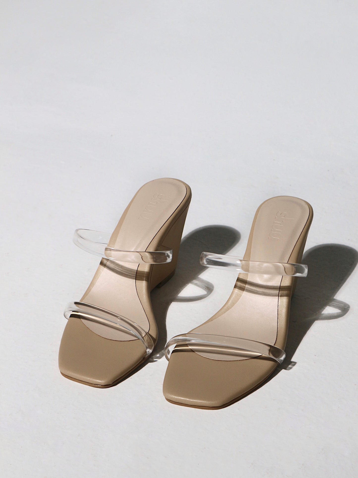 Alba Wedge Mules in Latte